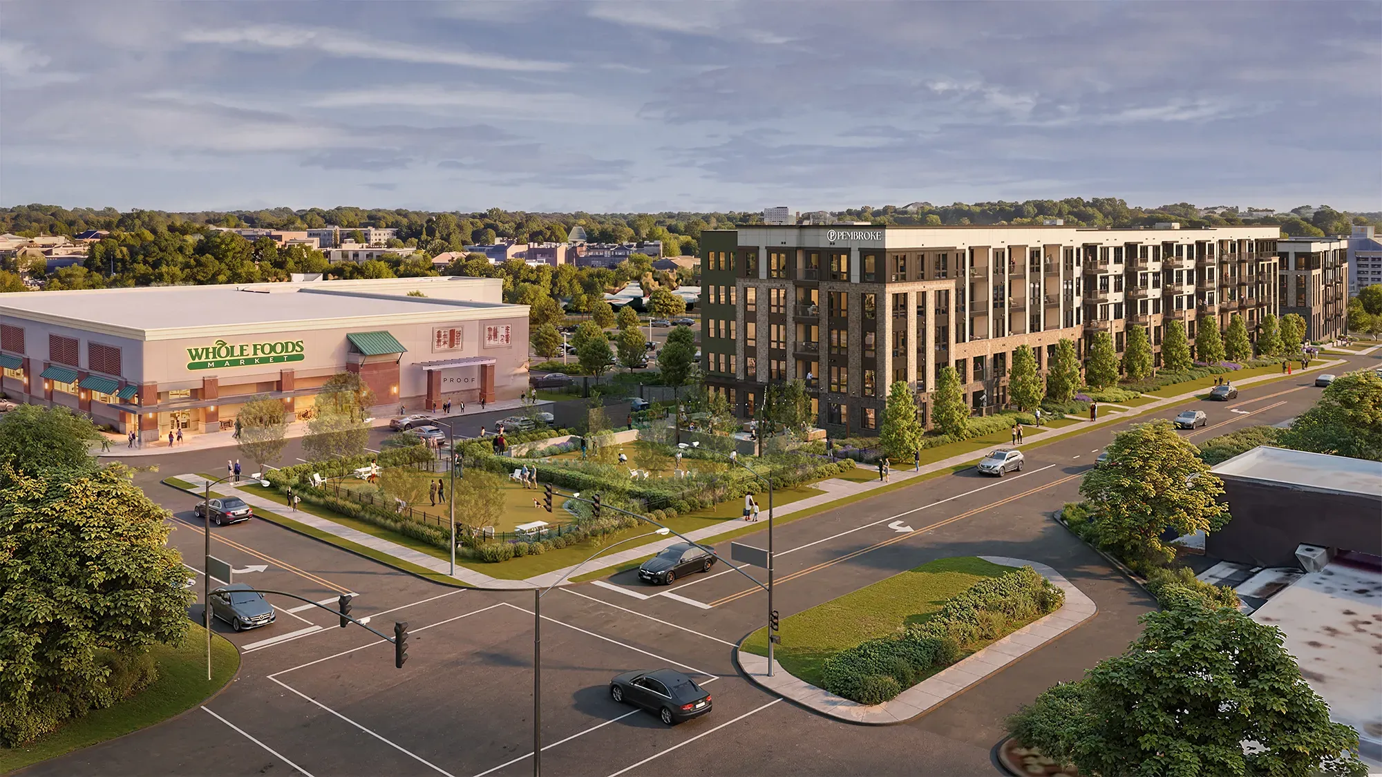 Pembroke at Friendly Center apartments beside Whole Foods Market and a landscaped park in Greensboro, NC