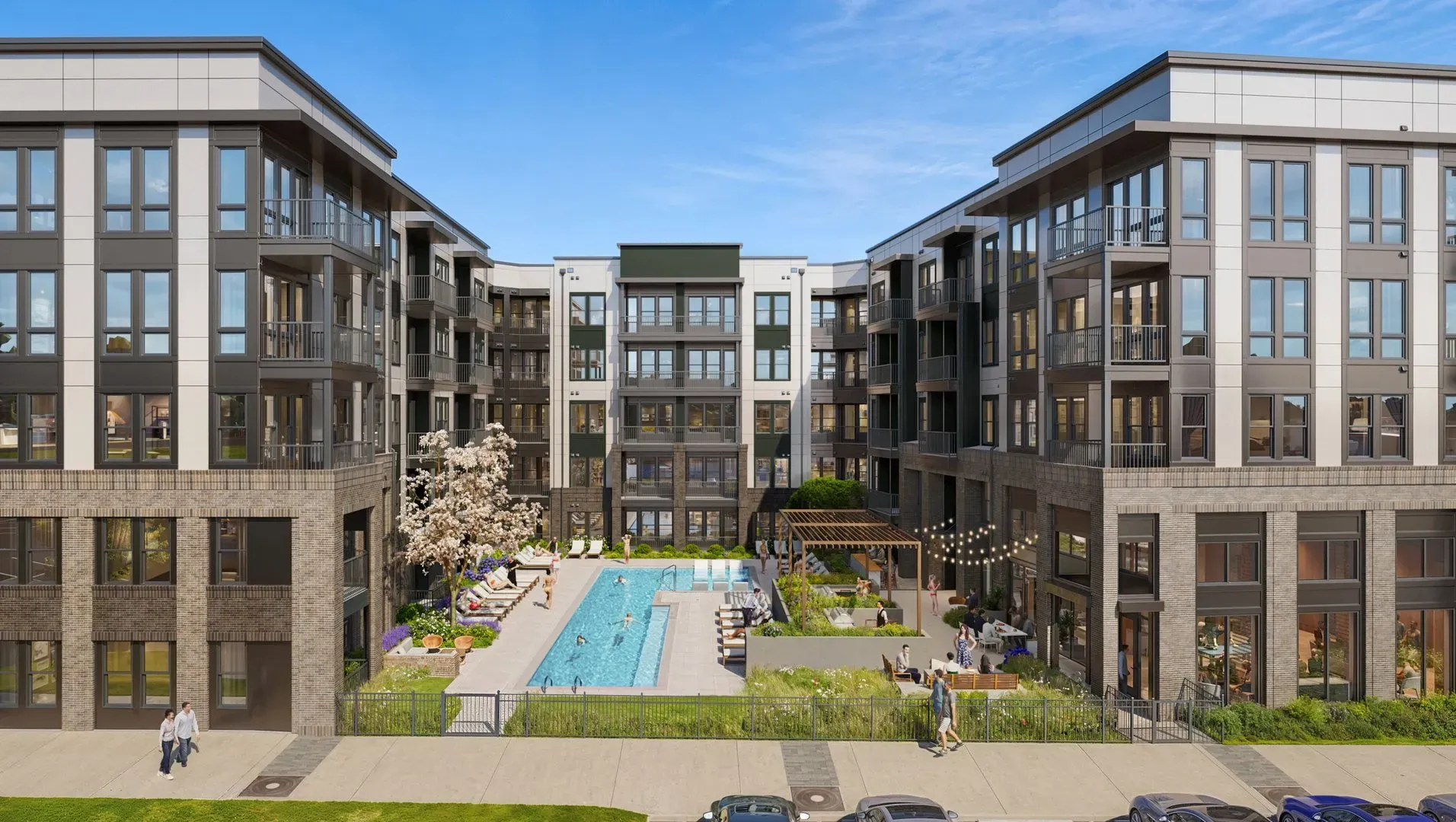 Resort-style pool courtyard with lounge chairs and a pergola at Pembroke at Friendly Center, Greensboro, NC
